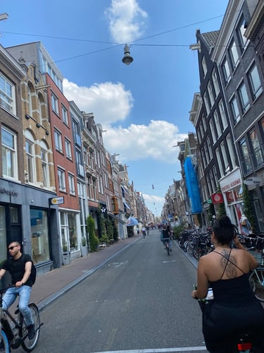 people riding bikes on Amsterdam